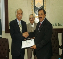 Mr. Shaukat Masud, President ICCI Awarding Founding Member Certificate to Mr. Saquib Mohyuddin, Former Chief NPO